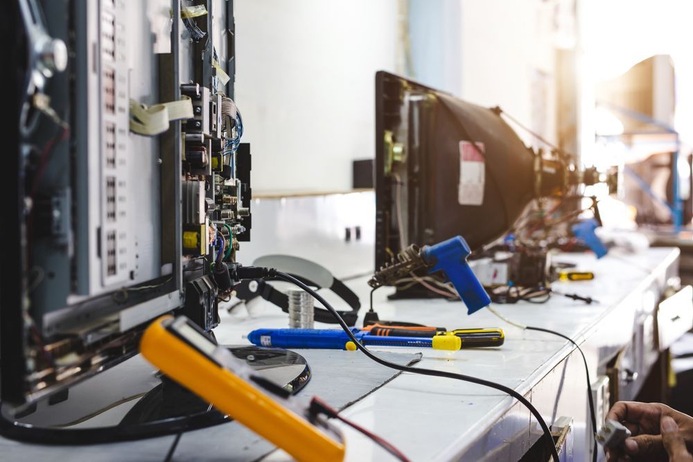 A Computer Monitor is Being Repaired in a Computer Repair Shop — Lismore Computer Solutions in Byron Bay, NSW
