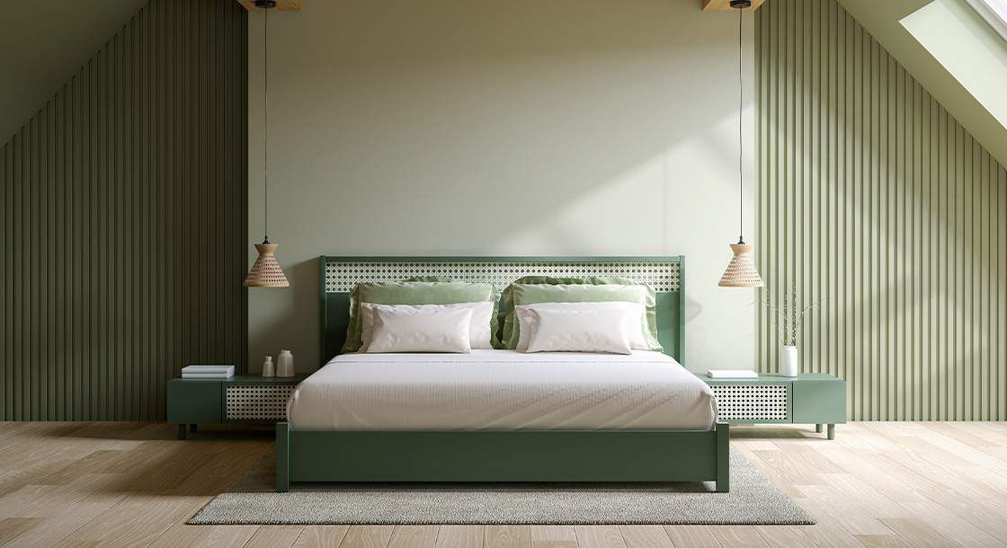 Quarto moderno com decoração em tons de verde, iluminação suave e cama confortável, ideal para um ambiente aconchegante e relaxante.