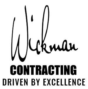 Wikman Contracting logo with black script text and bold slogan &ldquo;Driven by Excellence&rdquo;