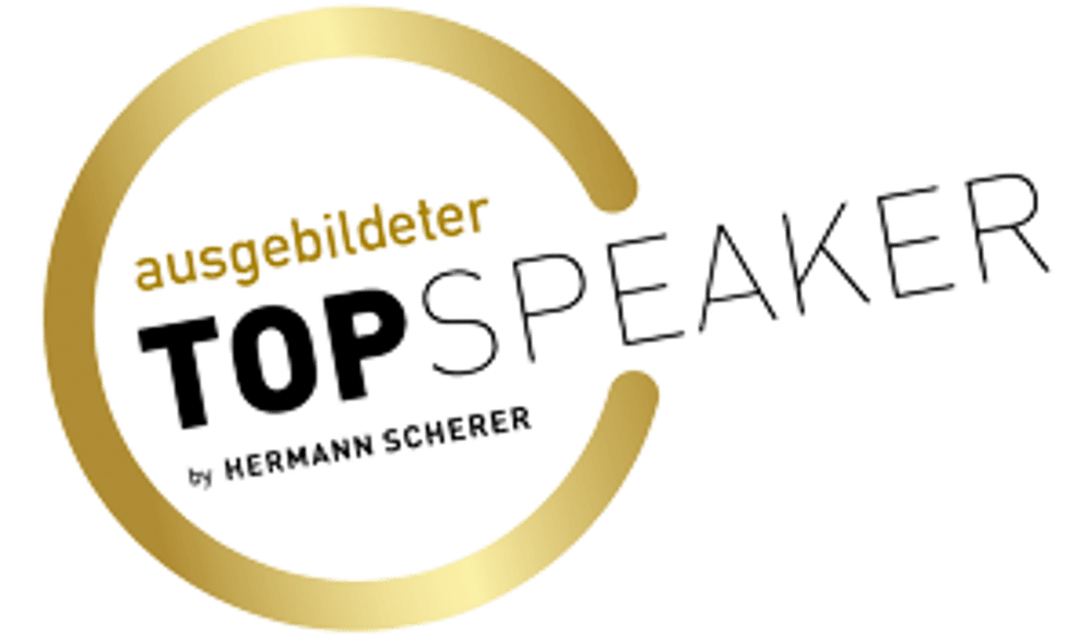 Gold circular logo with the words