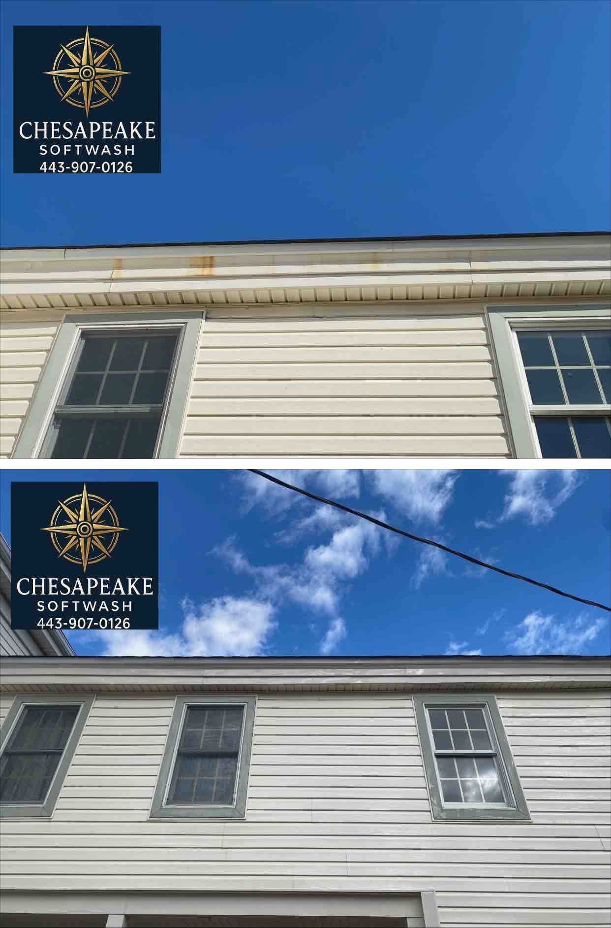 Chesapeake Bank sign above white building siding beneath a blue sky with clouds