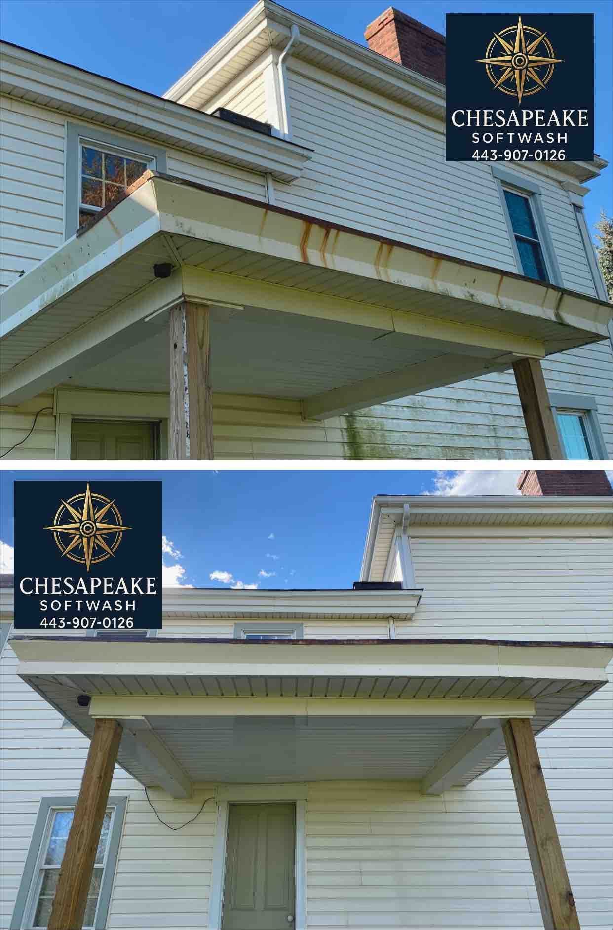 Two-story white house porch with twin watermark logos in the top left and bottom left corners