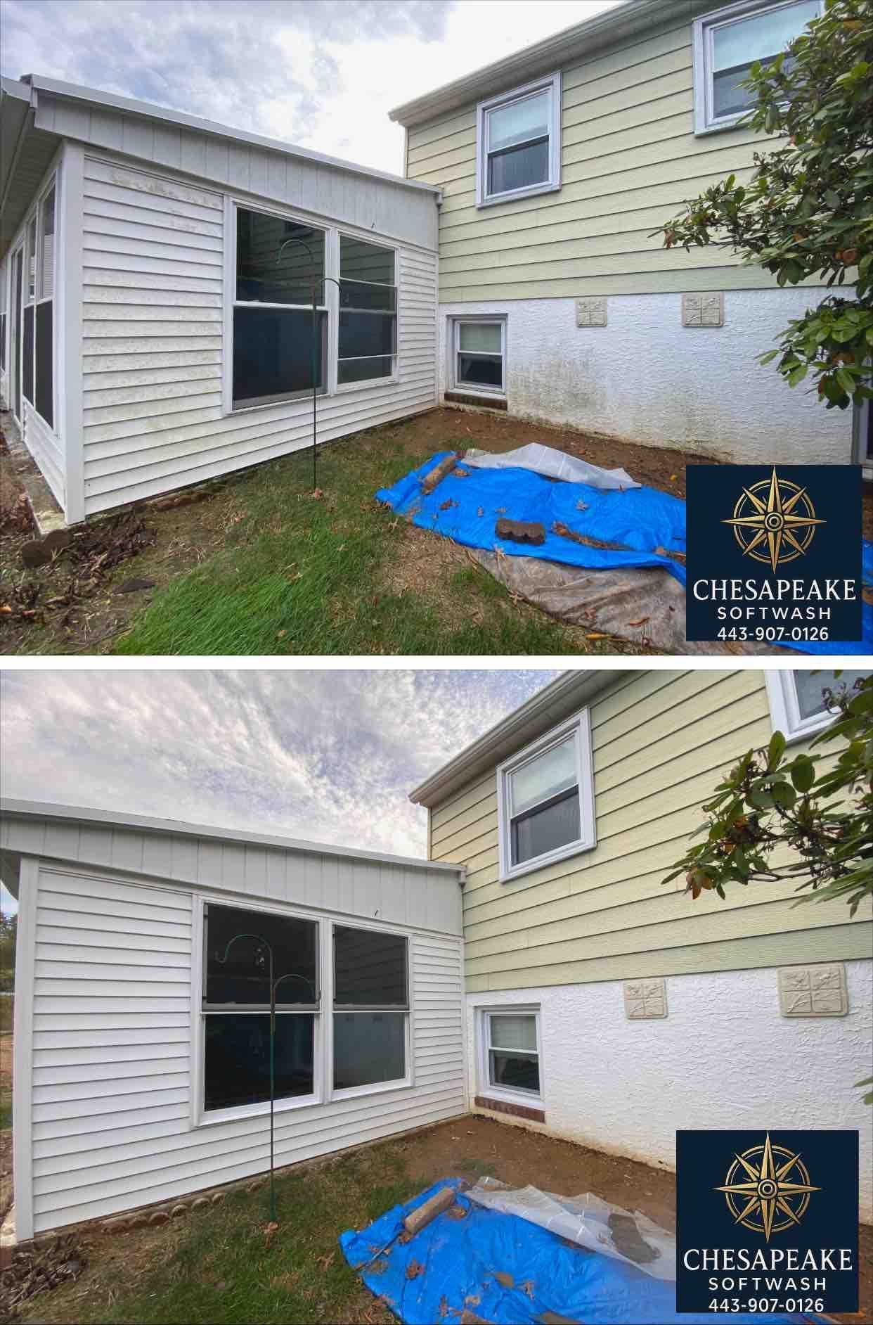 Backyard beside white house and shed, with blue tarp over dirt and a small window.