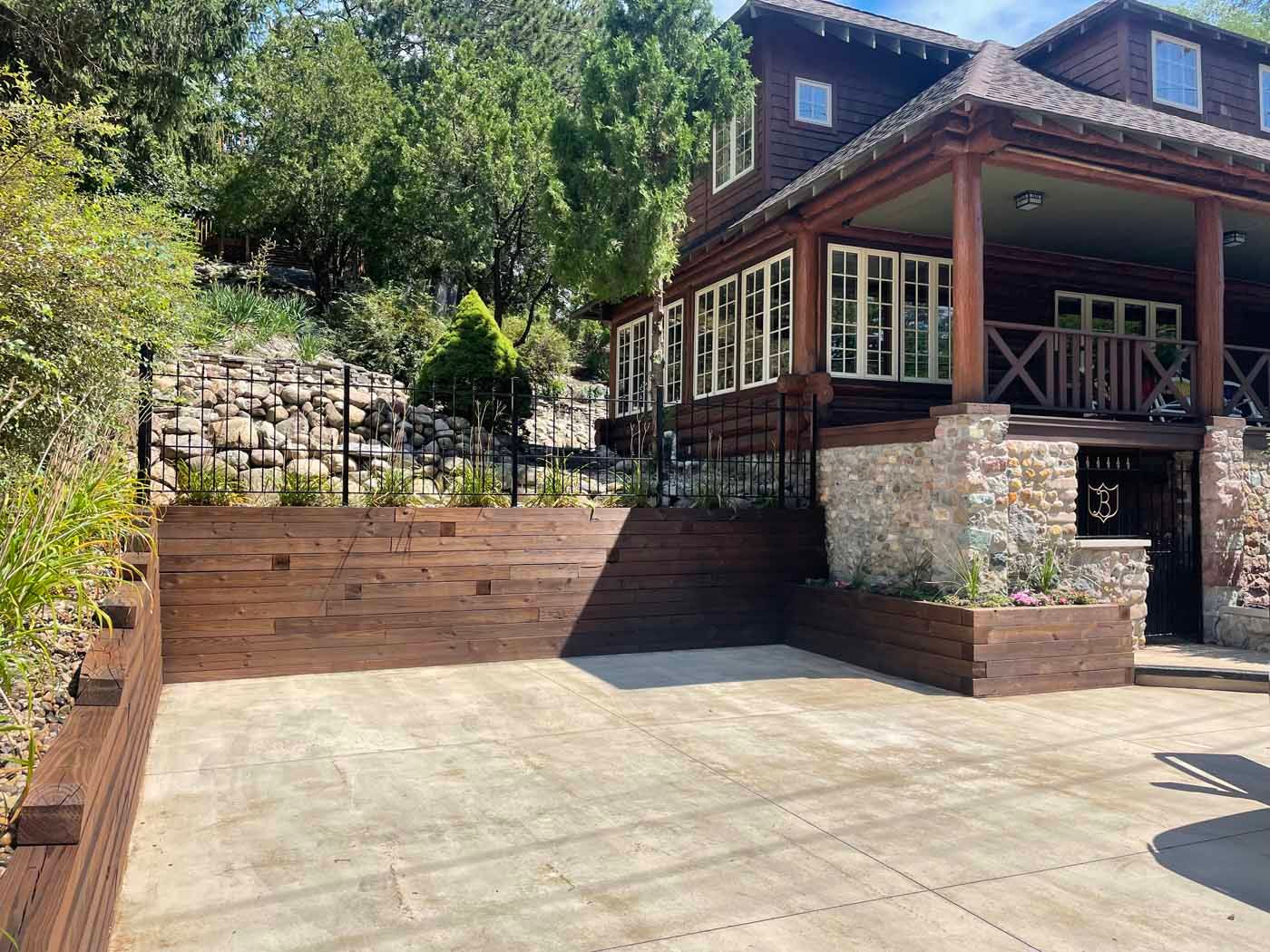 A large house with a large driveway in front of it.