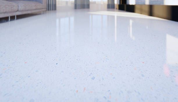 Seamless white terrazzo polished concrete floor with decorative aggregate flecks