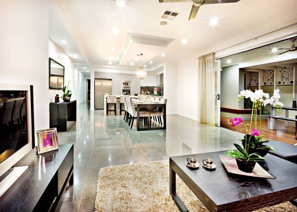 Luxury open concept living space with high-gloss polished concrete floors