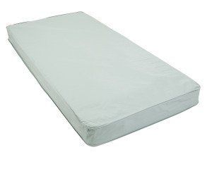 Light gray foam mattress on a white background
