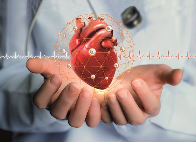heart on a doctor's hand