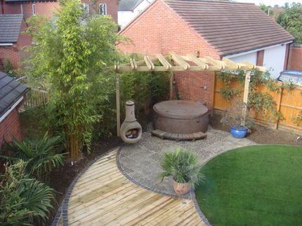 Established garden with bamboo screen