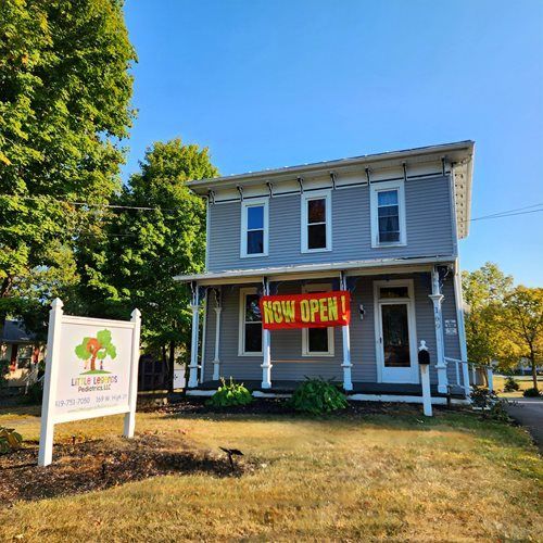 Gray two-story building with