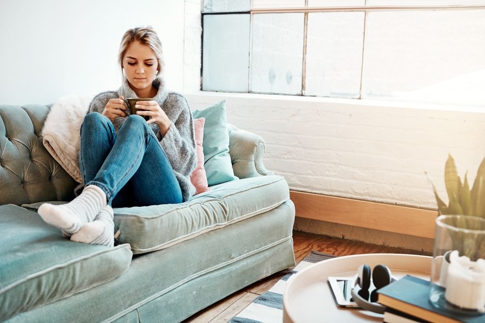 A college student in her apartment.
