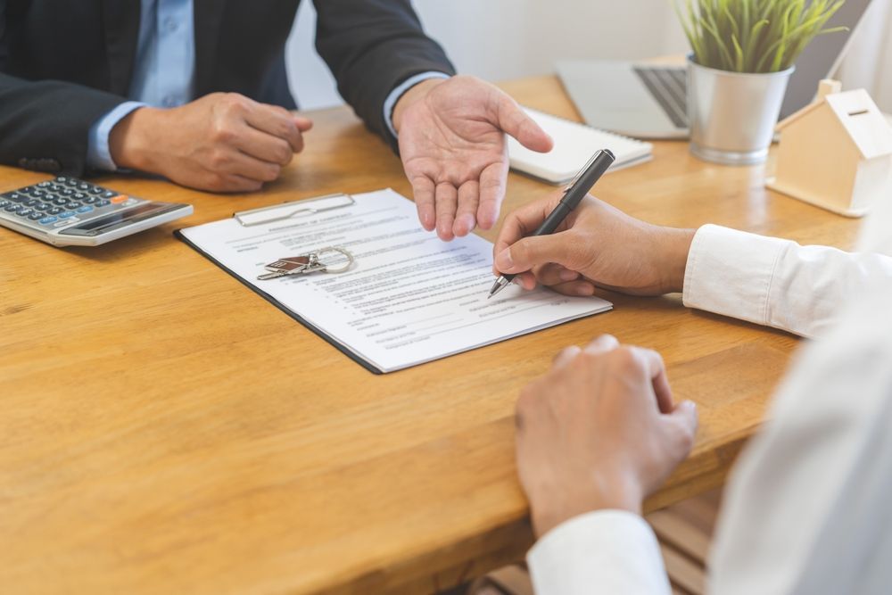 tenant signs rental lease