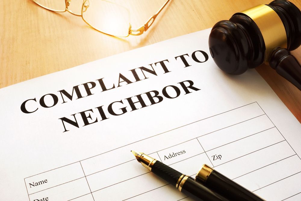 Someone is writing a noise complaint about a neighbor.