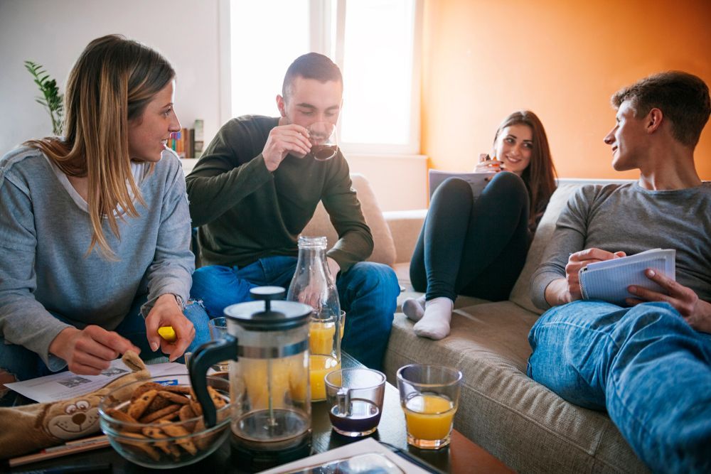 Students Learning In The Living Room
