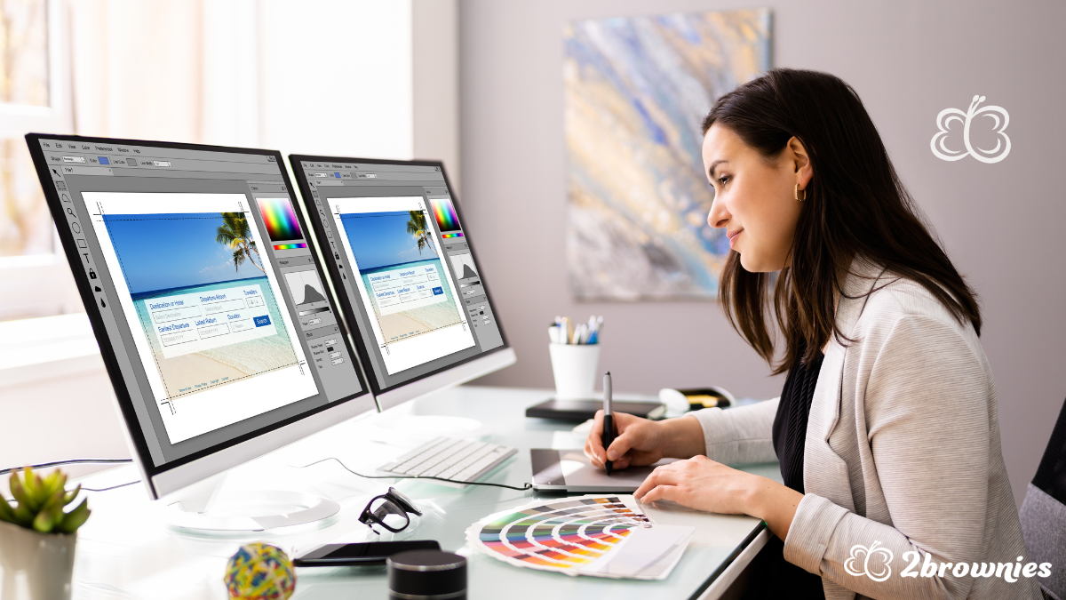 Woman designing a website on her computer