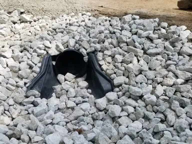 Riprap placed around a culvert entrance near a home at Lake Conroe, TX.