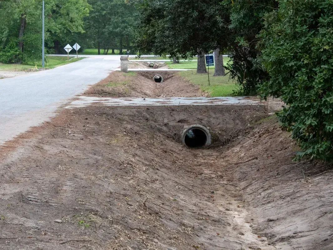 Clearing and ditch grading between culverts in Montgomery County, TX.