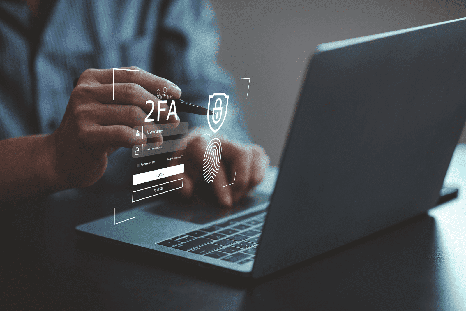 User logging into a laptop with two-factor authentication and fingerprint security.