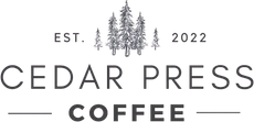 Cedar Press Coffee logo with cedar trees and “EST. 2022” in black and white