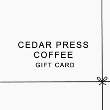 Cedar Press Coffee gift card on a white background with simple black text and ribbon line detail