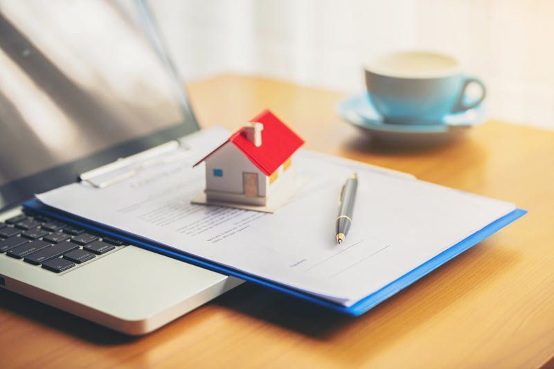 model of home on documents