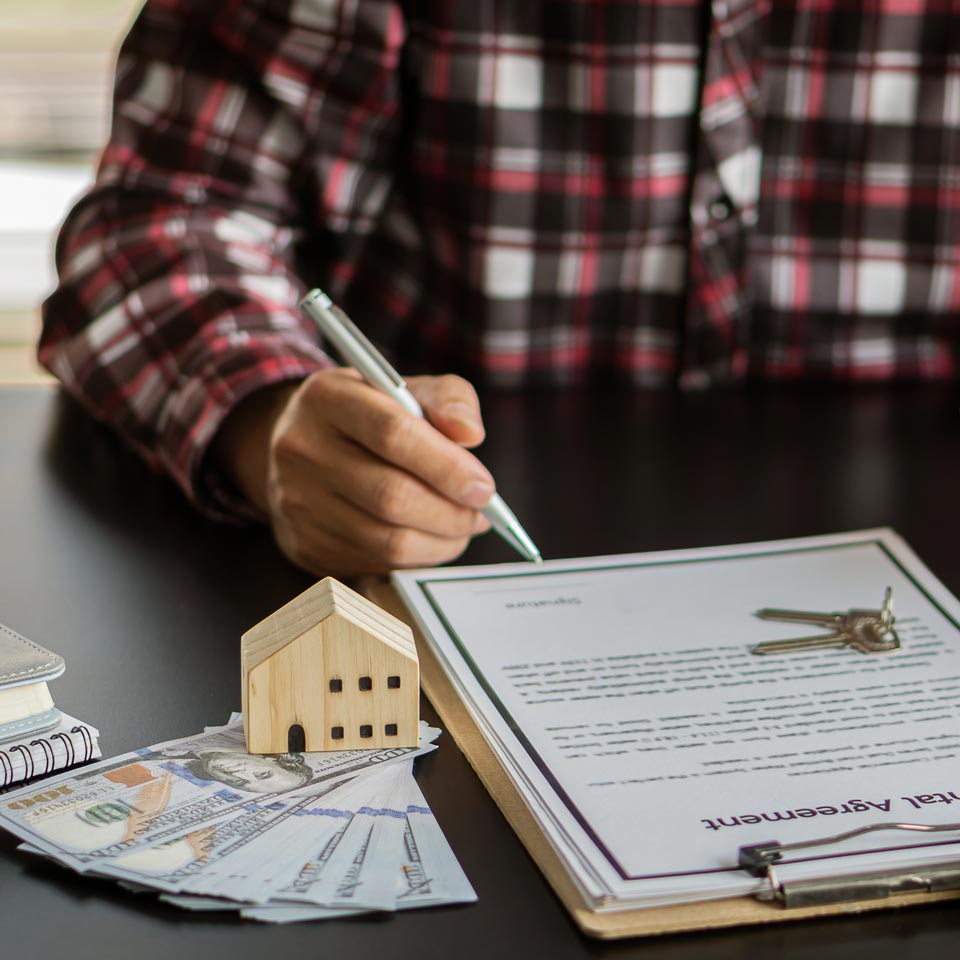 person signing paperwork