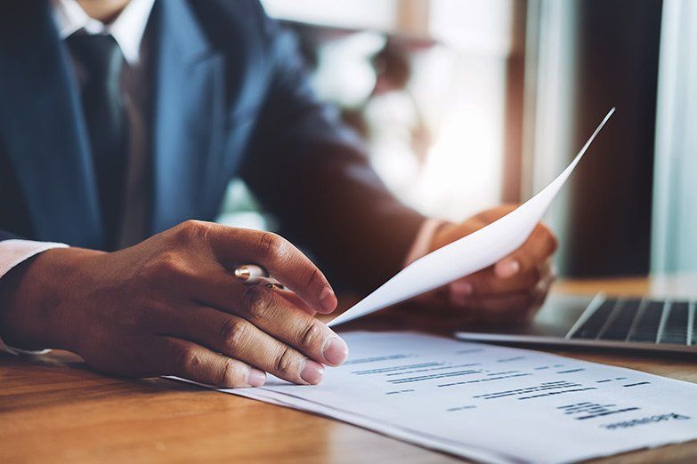 person signing paperwork