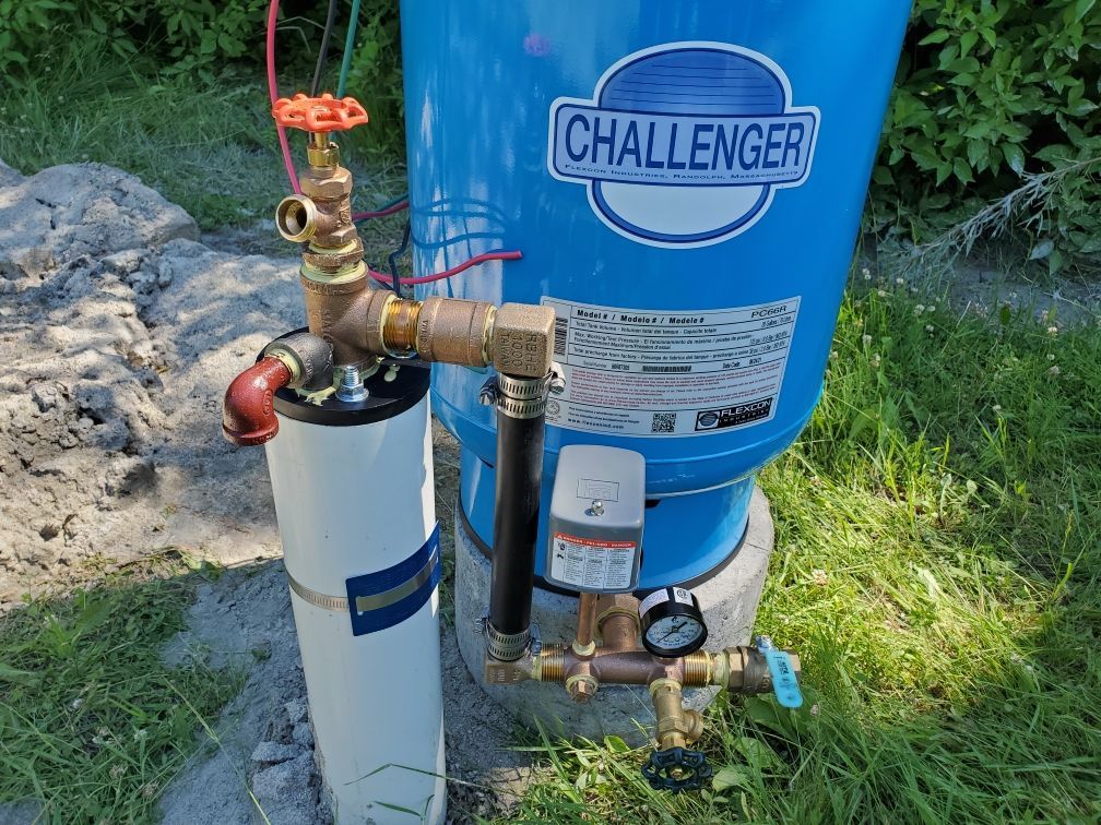 Plumber assembling connection for water well to household water system. Plumber assembling connection for water well to household water system.