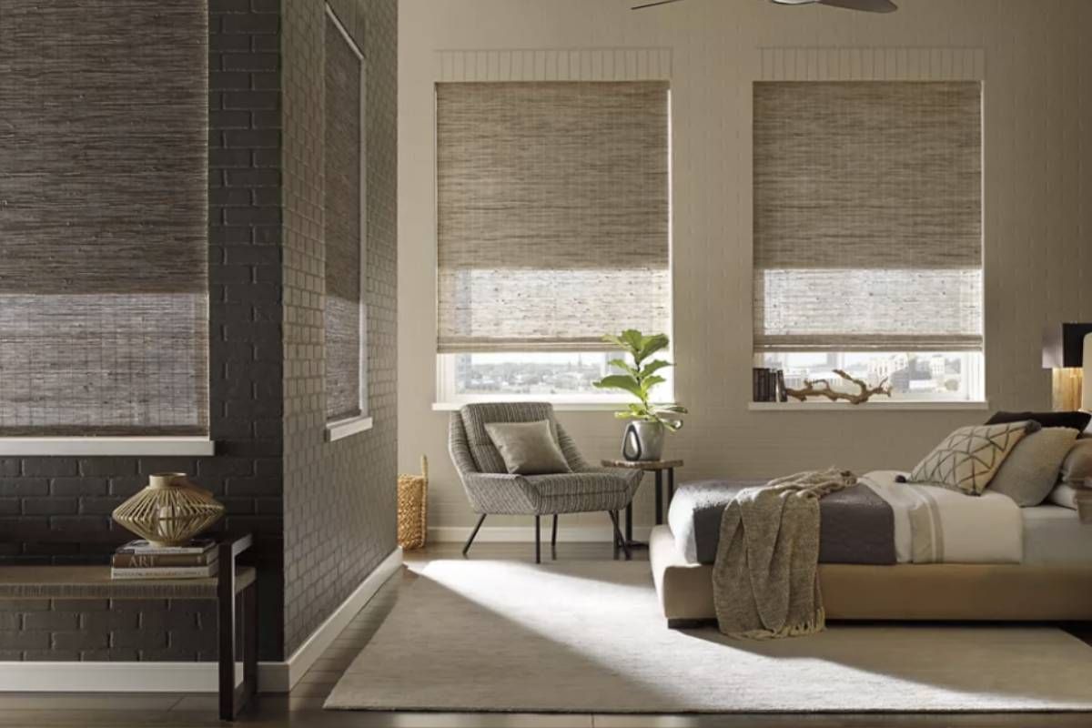 Hunter Douglas Provenance® Woven Wood Shades in a guest room near Vacaville, CA