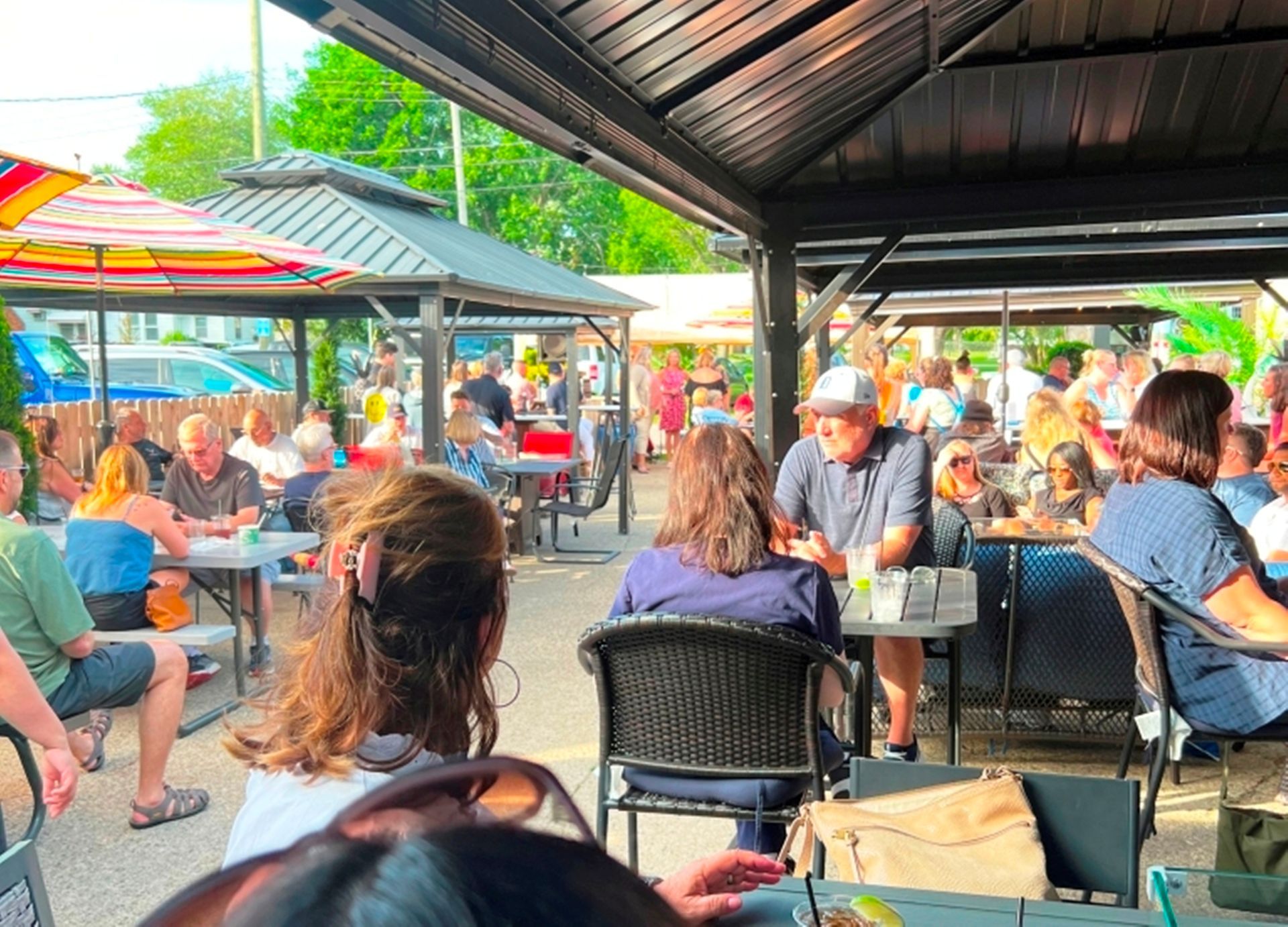 Outdoor Dining with heated gazebos and fire tables at On The Bay Restaurant in New Baltimore Michigan