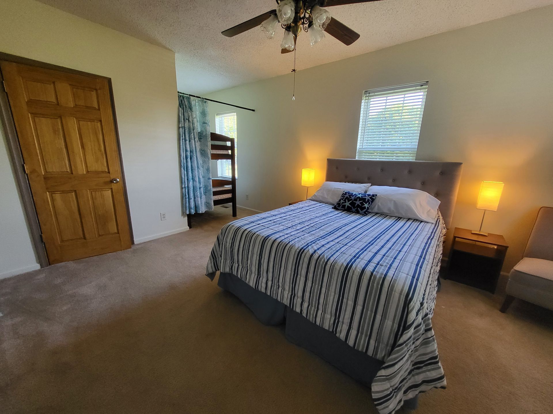 Osprey suite: queen size bed and bunk beds.