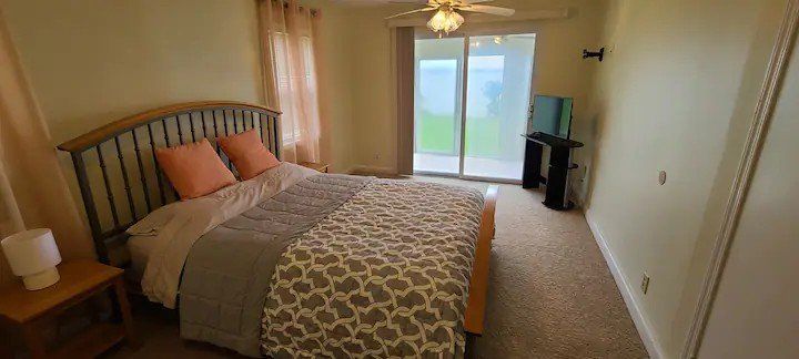 Queen size bed at Mermaids Folly cottage. 