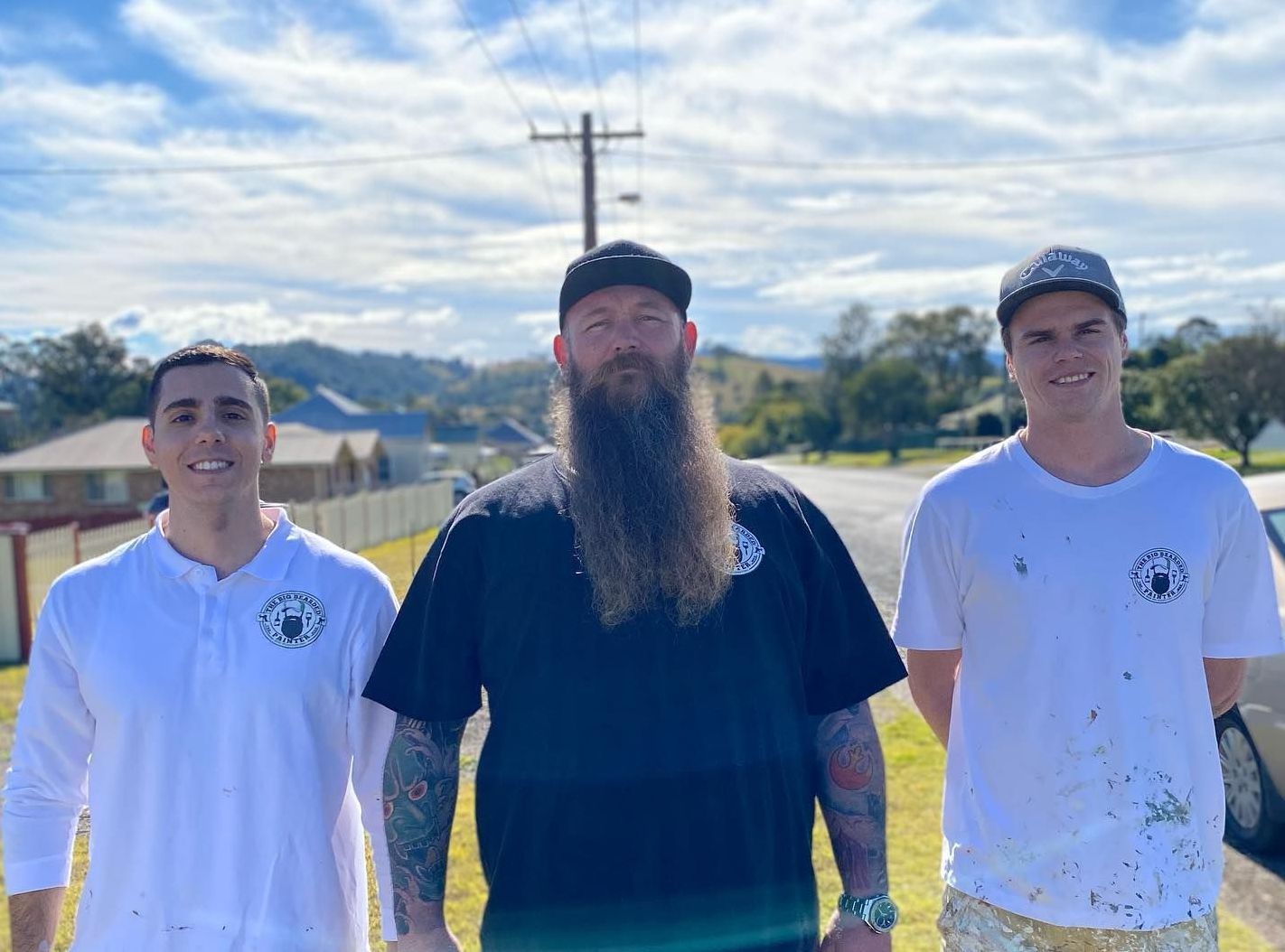 Three Men Are Standing Next to Each Other in a Field — The Big Bearded Painter In Booral, NSW