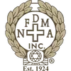 FDMA Inc. logo with laurel wreath and cross, est. 1924