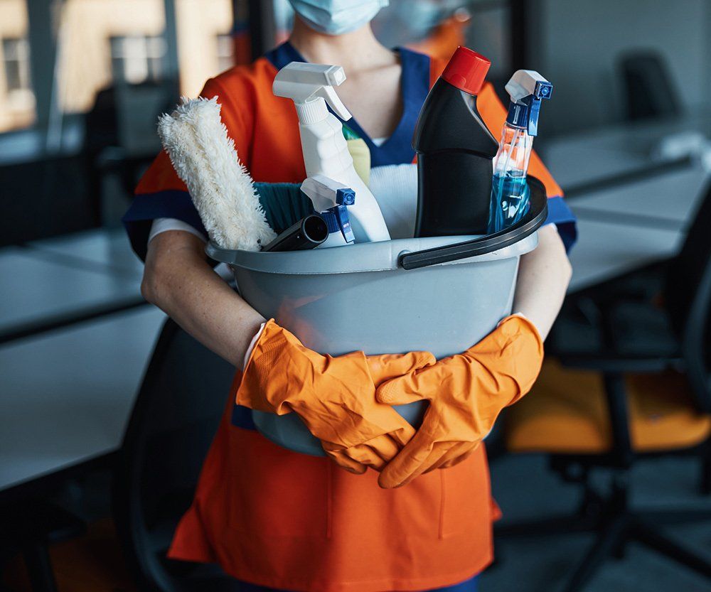 Cleaner Holding Cleaning Equipments — Laguna Niguel, CA — Margaret’s Cleaning Service Cleaner Holding Cleaning Equipments — Laguna Niguel, CA — Margaret’s Cleaning Service