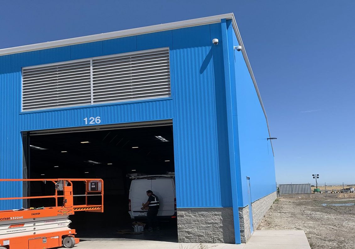 BOSS Best of Security Systems team installing a high-resolution digital IP camera in San Francisco