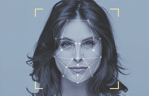 Woman's face being scanned by a facial recognition system