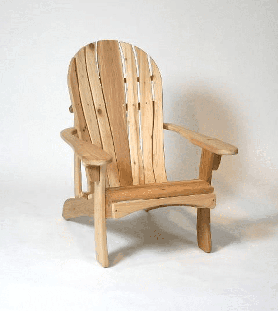 A wooden chair is sitting on a white surface