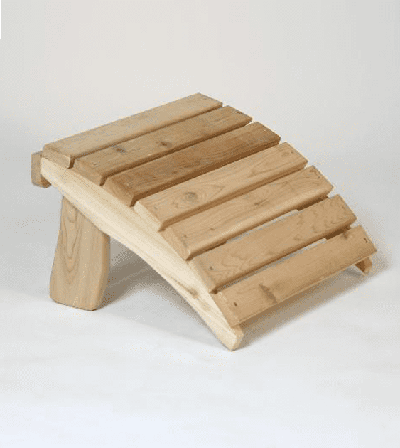 A wooden ottoman is sitting on a white surface