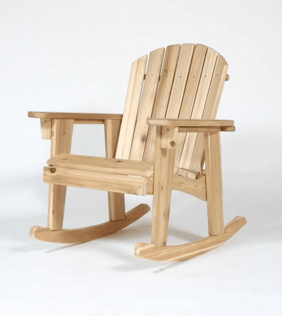 A wooden rocking chair is sitting on a white surface