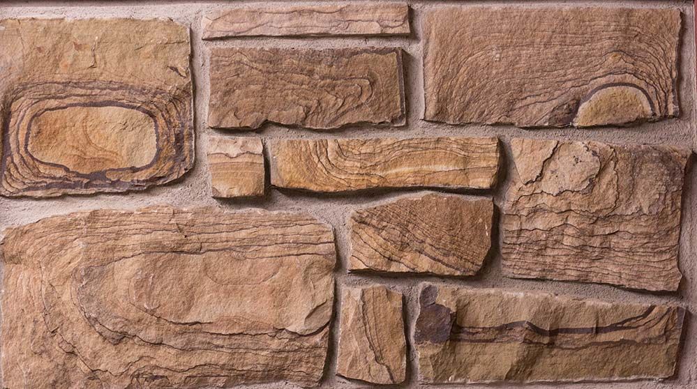 A brick wall with a lot of bricks on it