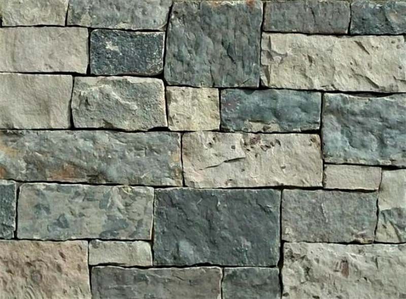 A close up of a stone wall made of bricks