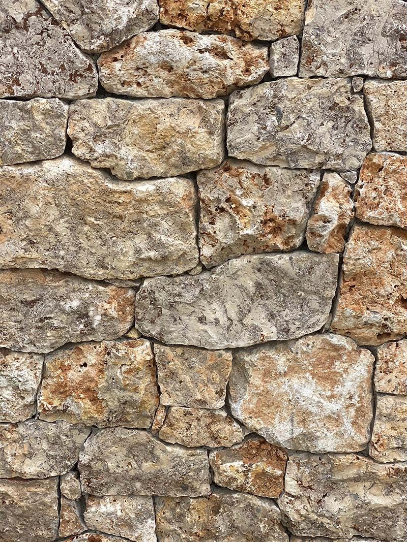 It is a close up of a stone wall.