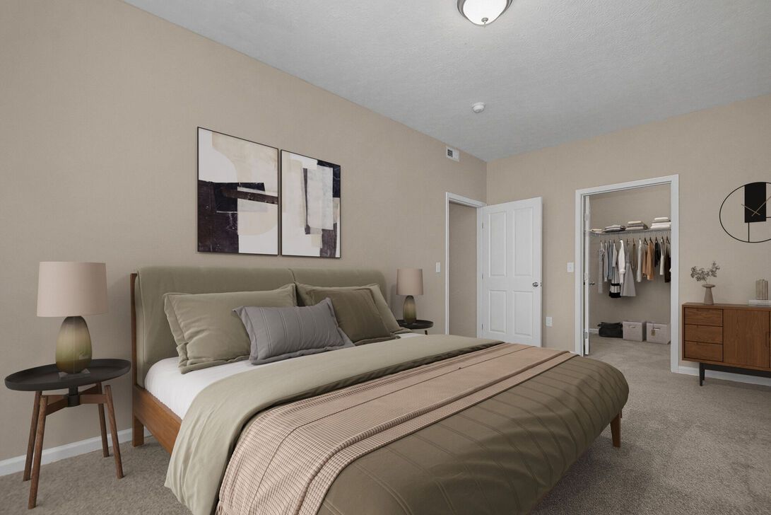 Neutral bedroom with a bed, nightstand, wall art, dresser, and open closet in beige tones