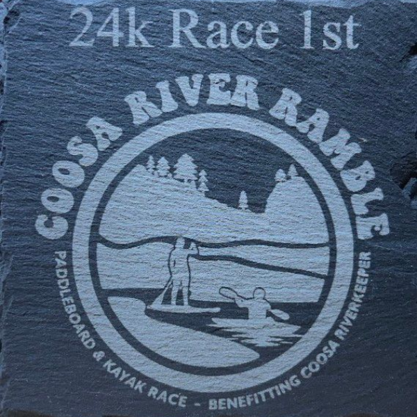 Blue T-shirt with “24k Race 1st” and a Coosa River Ramble paddleboard race logo.