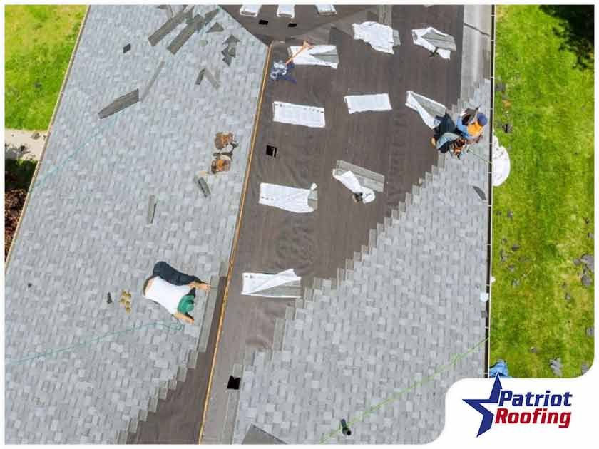 An aerial view of a roof being installed by patriot roofing.