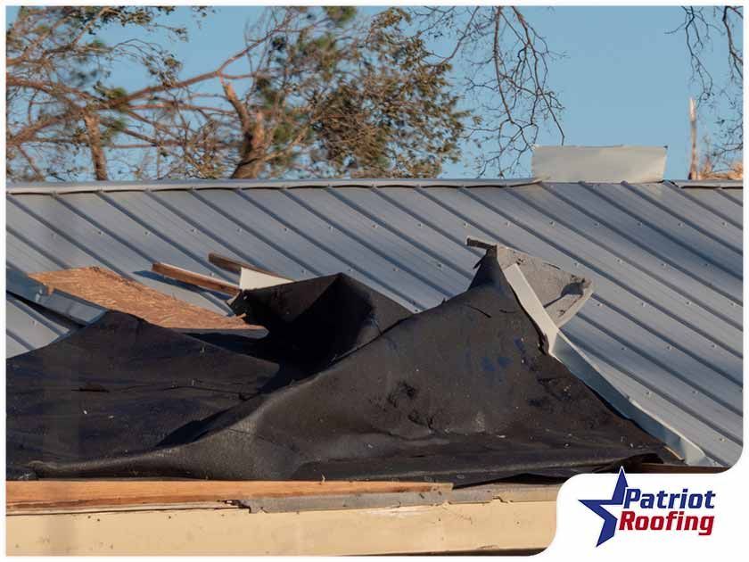 A roof that has been damaged by a storm.