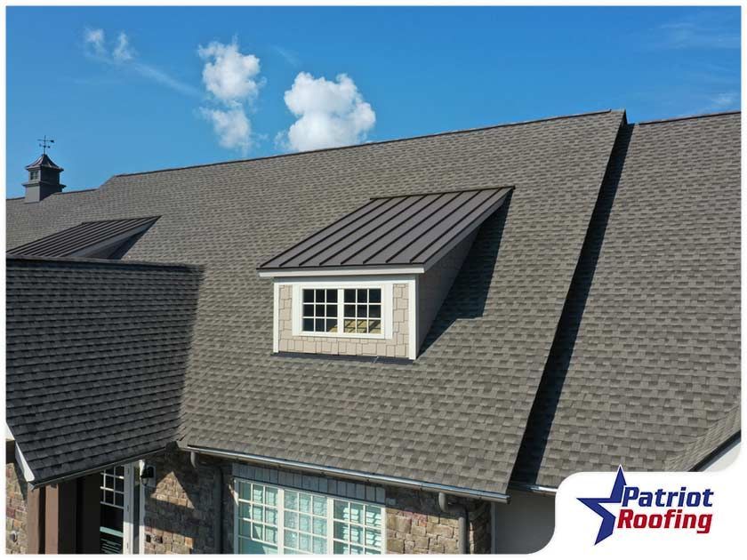 A picture of a house with a roof from patriot roofing