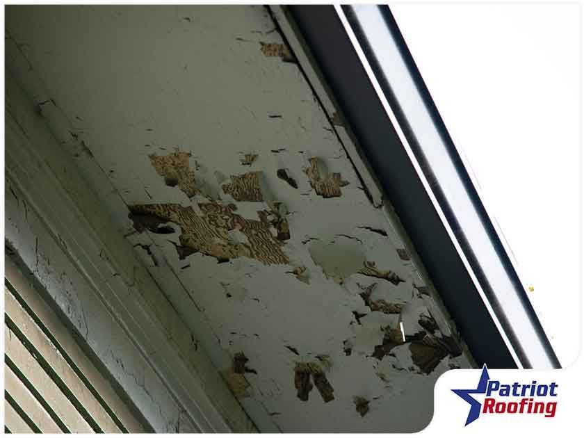 A picture of a roof that says patriot roofing on it