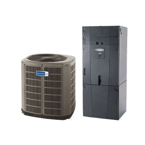 An air conditioner and a gas heater are sitting next to each other on a white background.